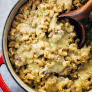 Steak and Cheddar Mac and Cheese in a pot with a spoon.